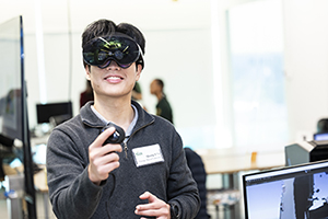 Student wearing VR goggles